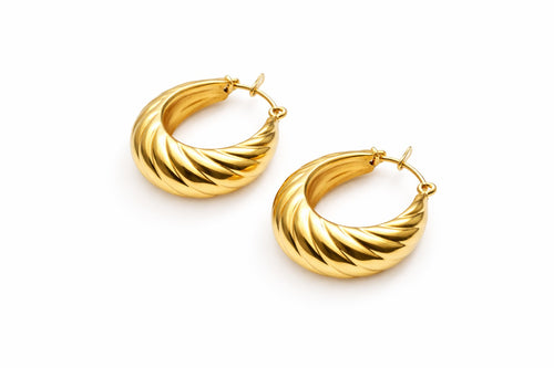 Lyza Jewels, LLC 18K gold plated stainless steel chunky hoop earrings with a ribbed texture. Hypoallergenic and durable.
