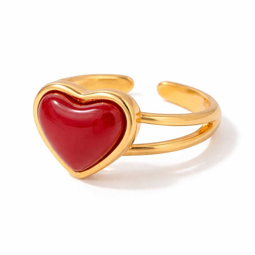 Lyza Jewels, LLC adjustable 18k gold stainless steel ring with a red heart-shaped carnelian stone.