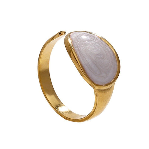 Lyza Jewels, LLC adjustable ring in 18k stainless steel with iridescent mother-of-pearl inlay. Oval shape.