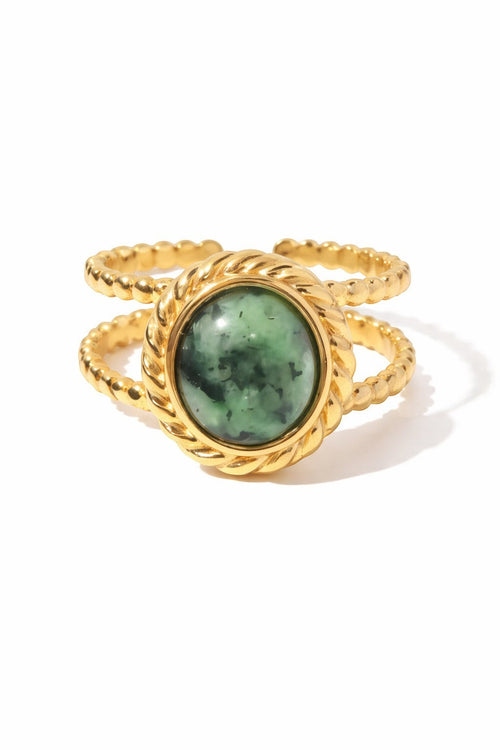 Lyza Jewels, LLC adjustable 18k gold stainless steel ring with a round green African turquoise stone and twisted band.