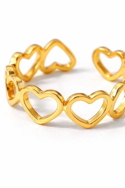 Lyza Jewels, LLC 18k gold plated stainless steel adjustable ring with connected hearts design.