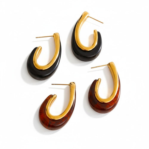 Lyza Jewels, LLC gold and black/amber marbled acrylic hoop earrings with tapered silhouette. Water-resistant and tarnish-free.