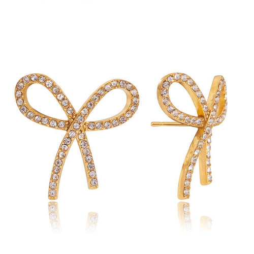 Lyza Jewels, LLC gold-tone stainless steel bow stud earrings with clear crystal embellishments.