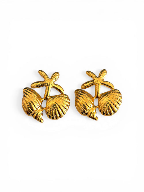 Lyza Jewels, LLC 18K gold plated stainless steel earrings featuring starfish, conch, and scallop shell charms. Water-resistant and tarnish-free.