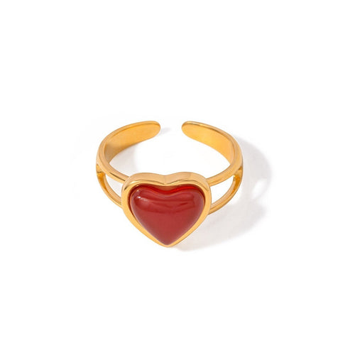 Lyza Jewels, LLC adjustable gold stainless steel ring with red heart-shaped carnelian stone.