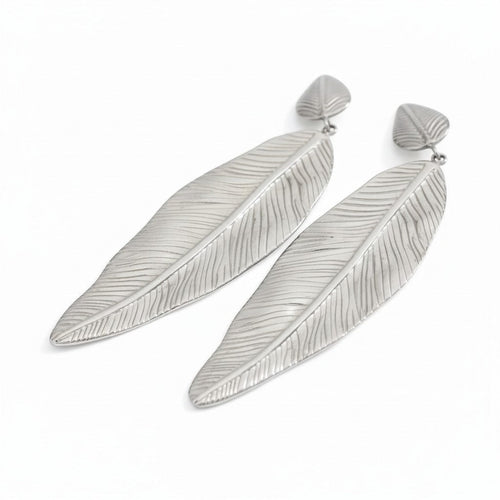 Lyza Jewels, LLC 18K gold-plated stainless steel leaf drop earrings with textured detail.