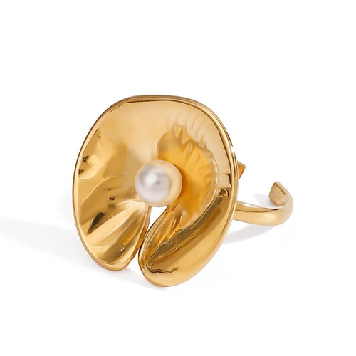 Lyza Jewels, LLC gold stainless steel adjustable ring with irregular imitation pearl accent.