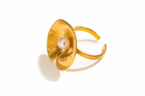 Lyza Jewels, LLC adjustable gold stainless steel ring with irregular imitation pearl accent.