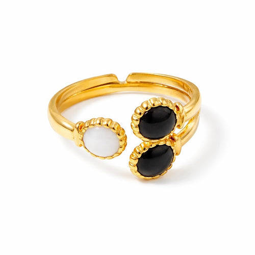 Lyza Jewels, LLC adjustable gold ring with oval white and black stones, 18k stainless steel.