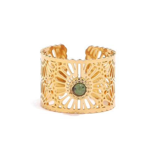 Lyza Jewels, LLC gold stainless steel adjustable ring with intricate cut-out pattern and green stone center.