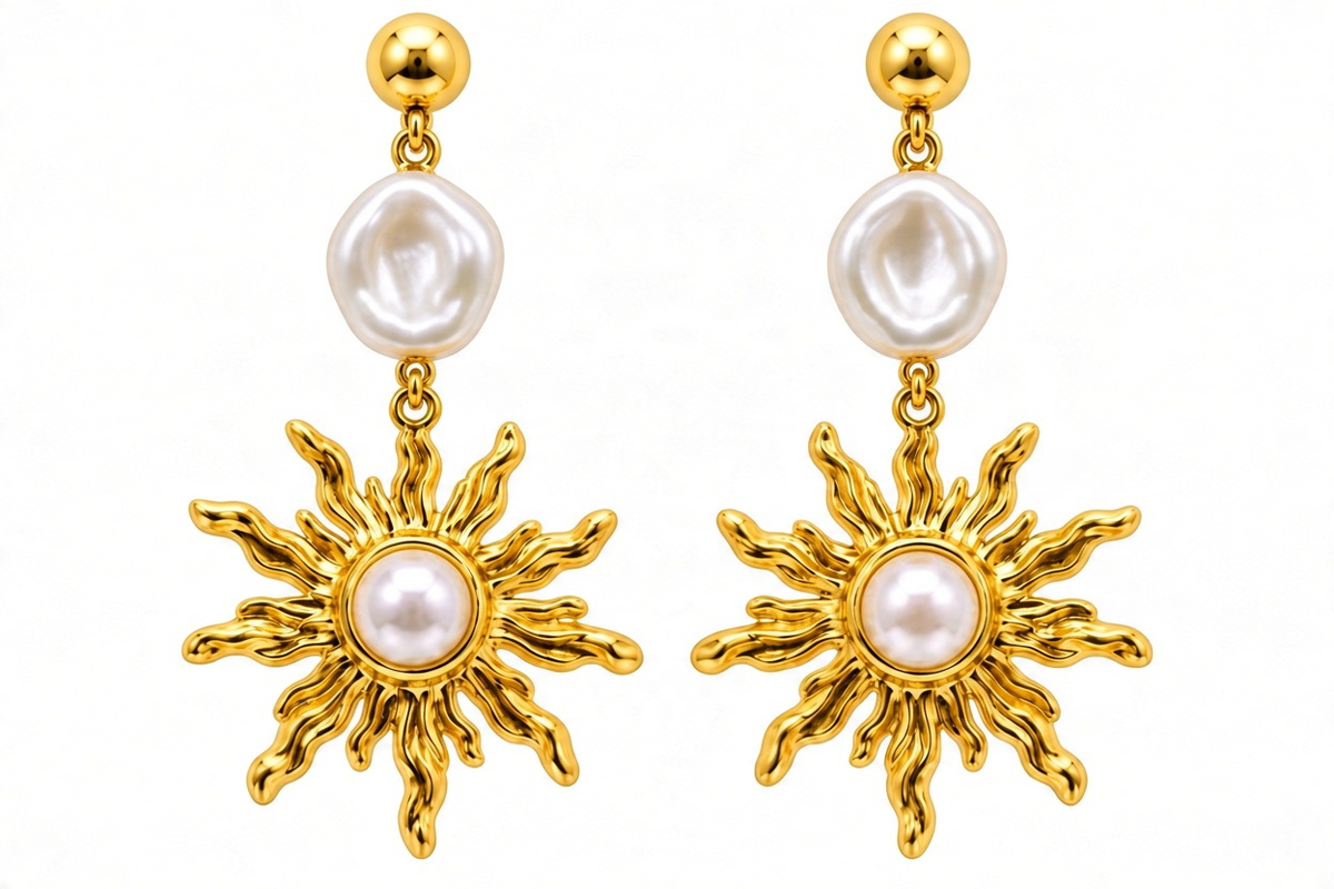 Lyza Jewels, LLC gold-plated sunburst drop earrings featuring round and baroque pearl accents on a white background.
