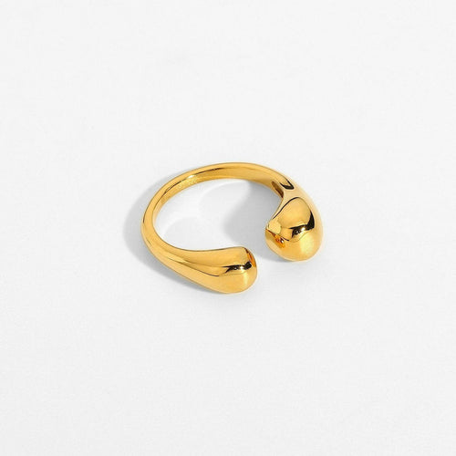 Lyza Jewels, LLC 18k gold plated stainless steel adjustable teardrop ring with a fluid, minimalist design.