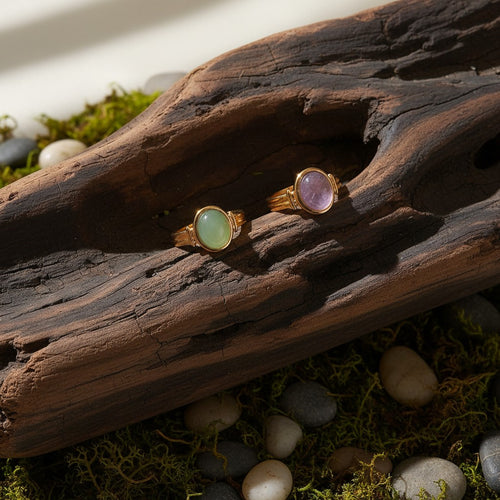 Lyza Jewels, LLC 18k gold adjustable ring with a smooth, oval, light green natural stone. Hypoallergenic and tarnish-proof.