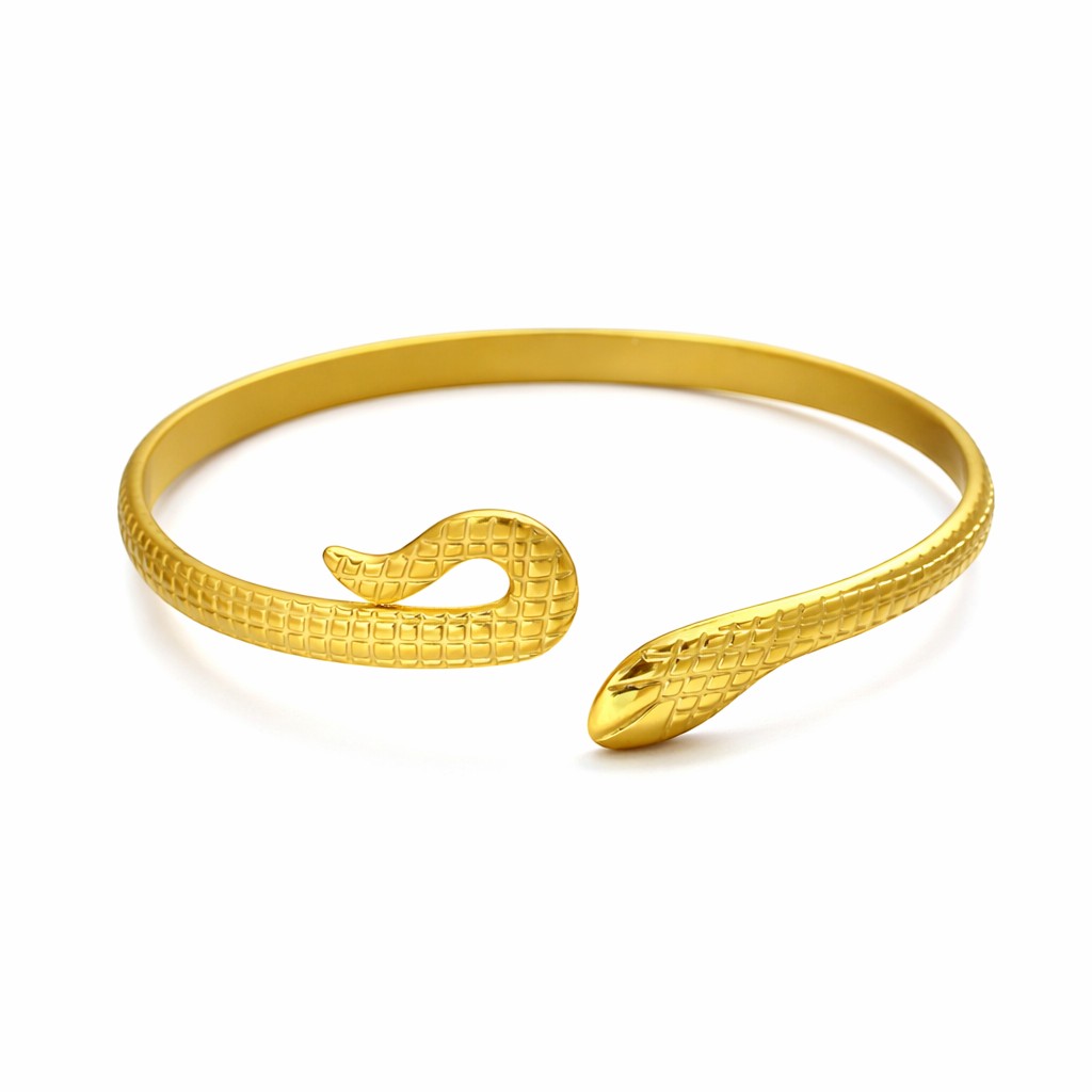 Lyza Jewels, LLC gold-tone serpentine open cuff bracelet with intricate textured snake scale detailing.