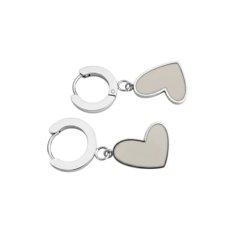 Lyza Jewels, LLC silver stainless steel huggie hoop earrings with white inlay heart charms. Water-resistant and tarnish-free.