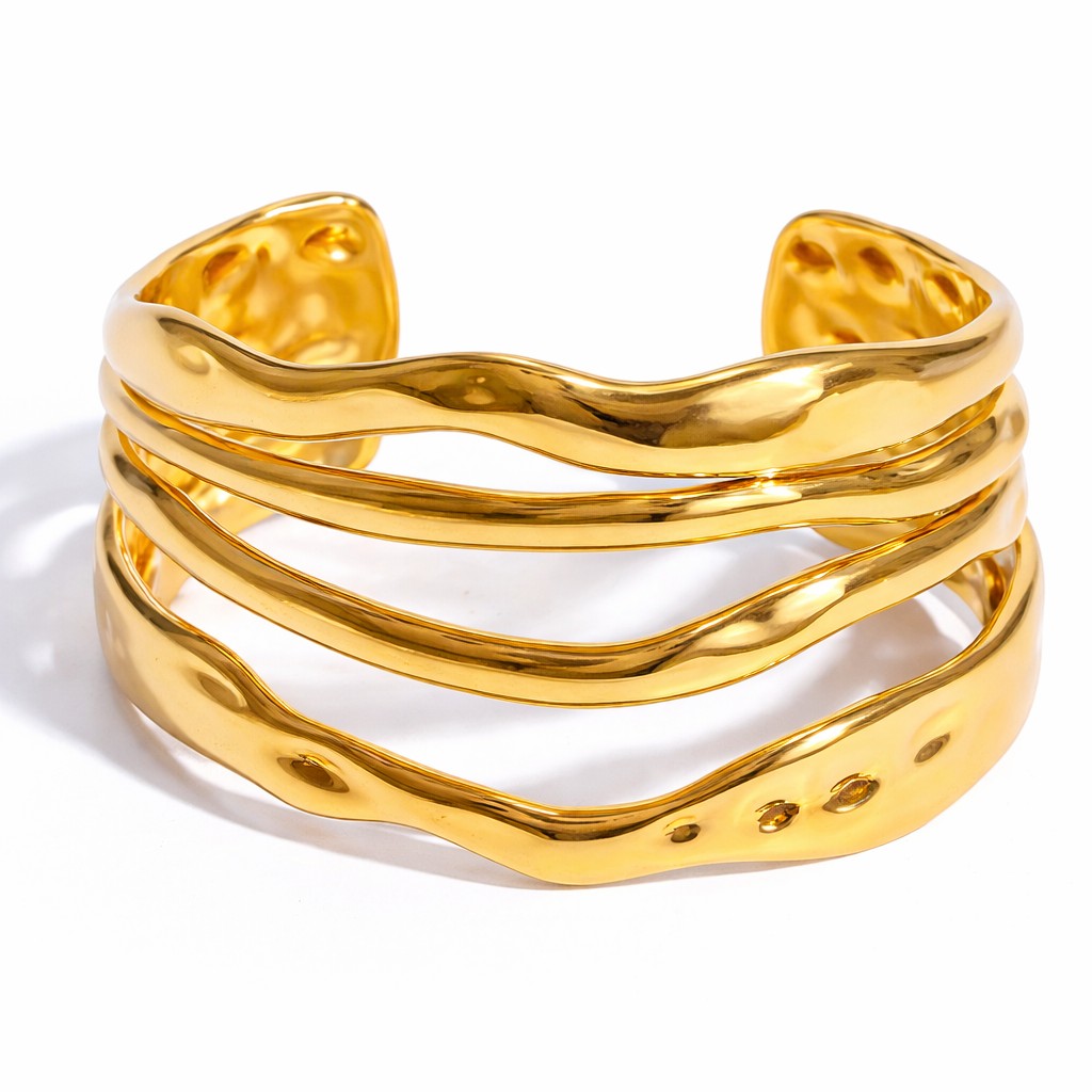Lyza Jewels, LLC gold-tone wavy multi-band cuff bracelet with a high-polish finish and open-cuff design.